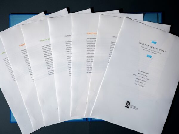 The broadsides making up Short Stories in Print are fanned out for display