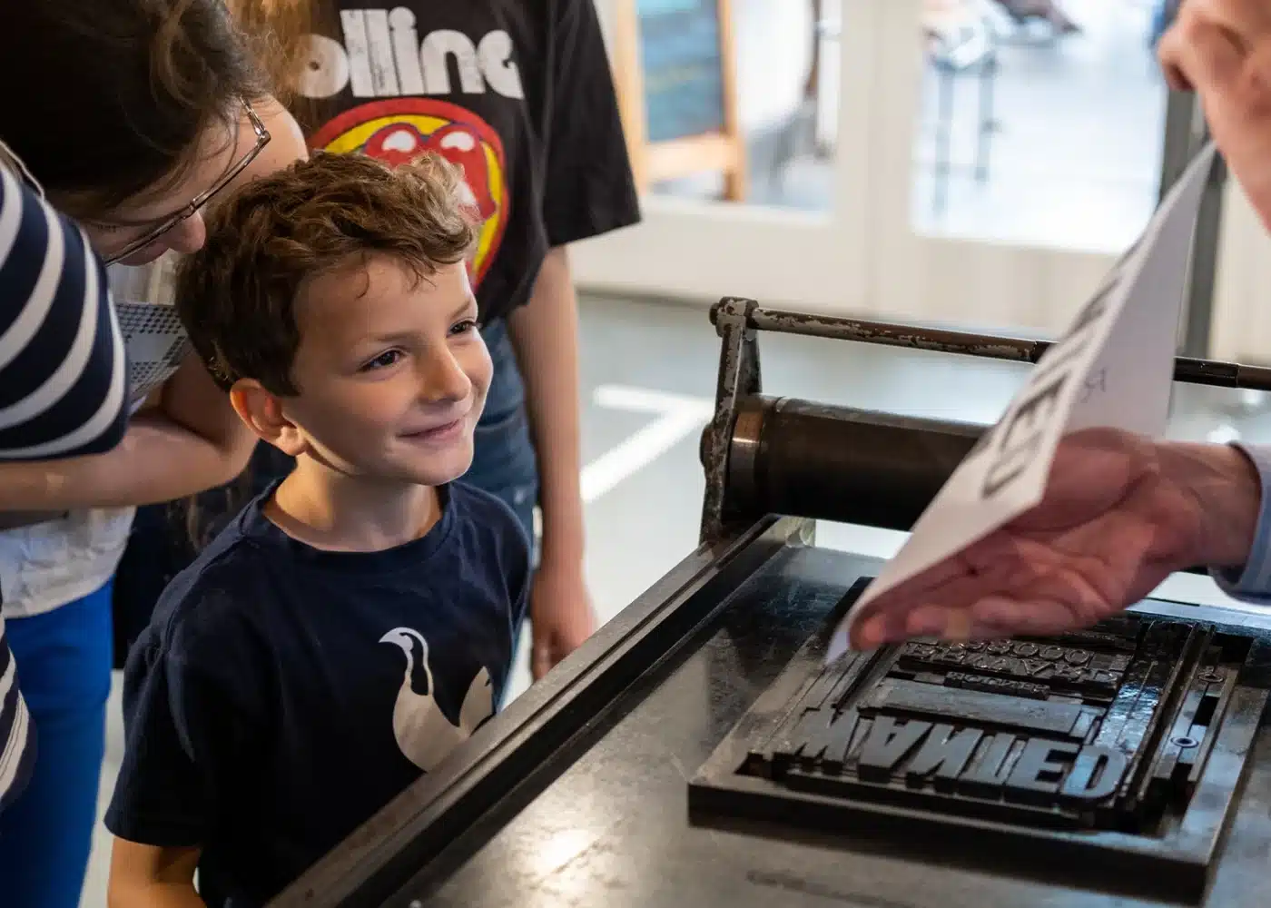 Boy engaging in Print Tour