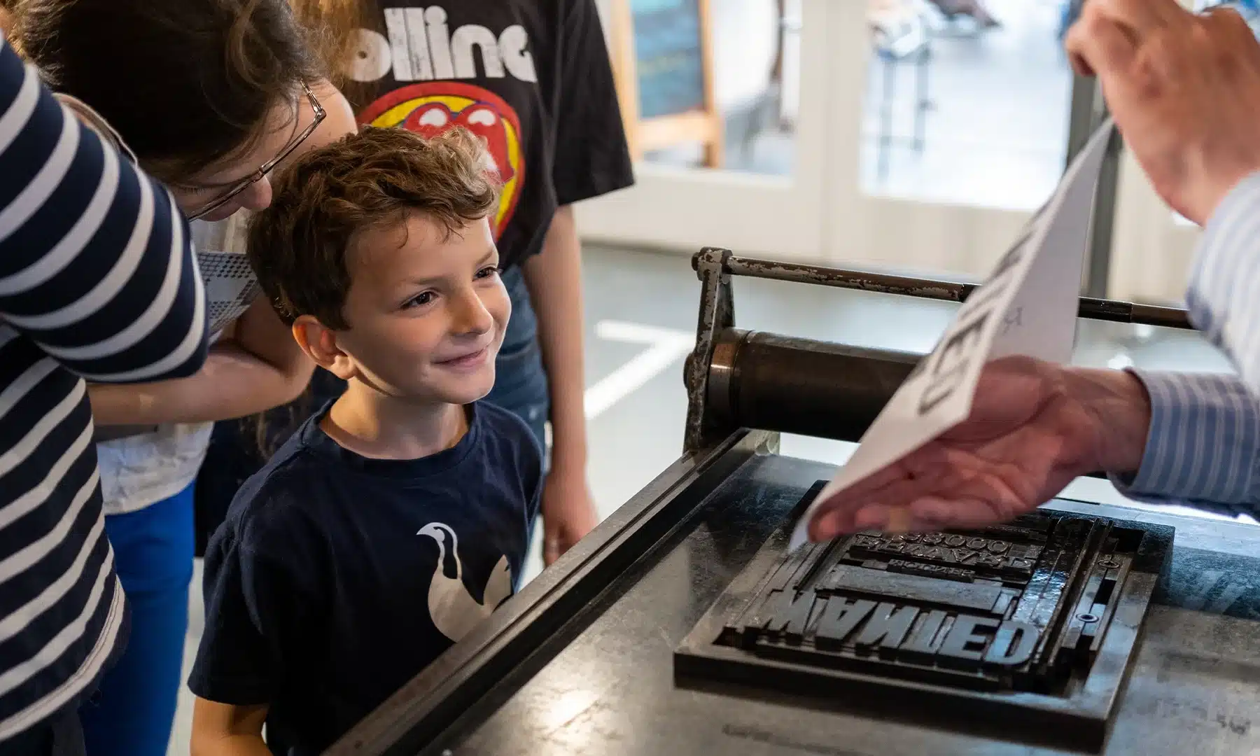 Boy engaging in Print Tour