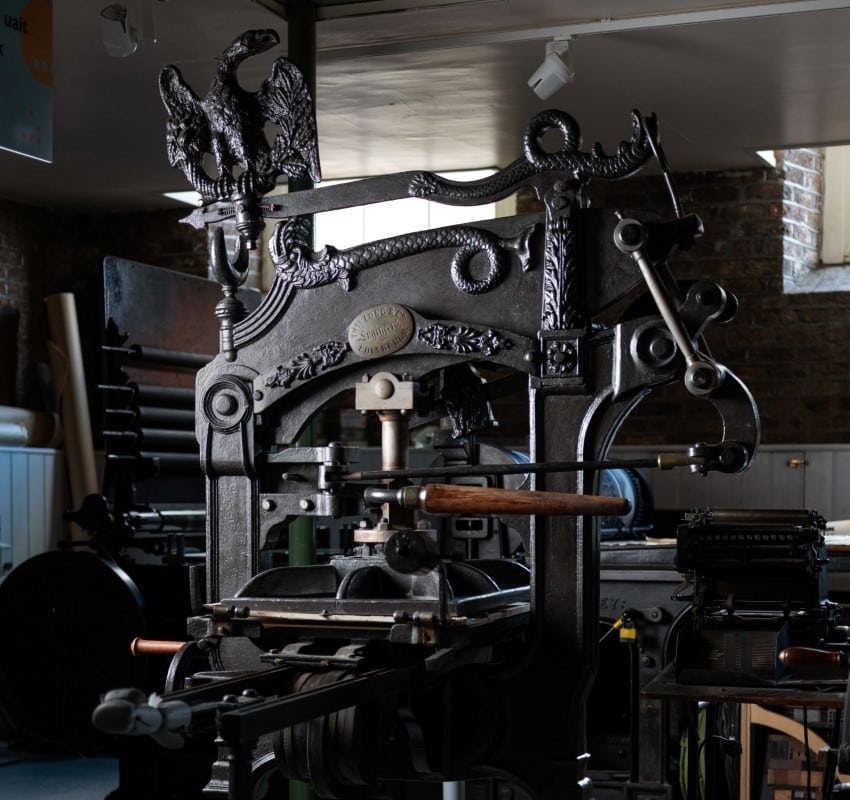 A black, cast-iron Columbian printing press at the National Print Museum