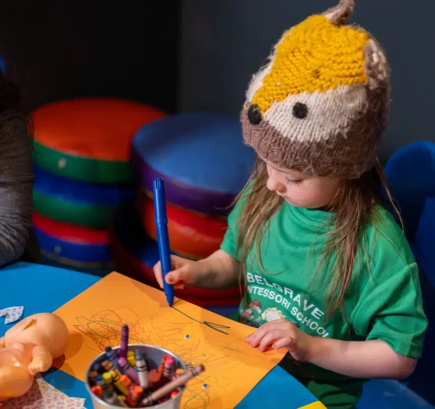 Preschool girl drawing