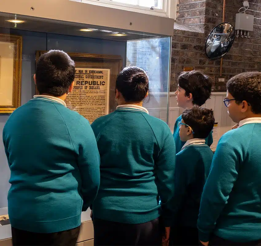Students looking at treaty poster