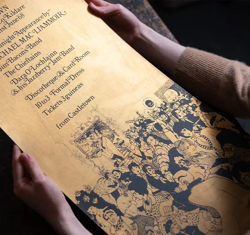 Woman holding archival piece
