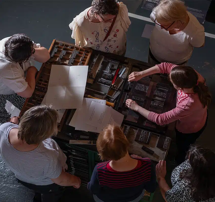 Workshop event in print museum with a group of people