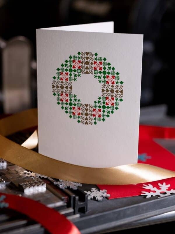 letterpress christmas card depicting a wreath