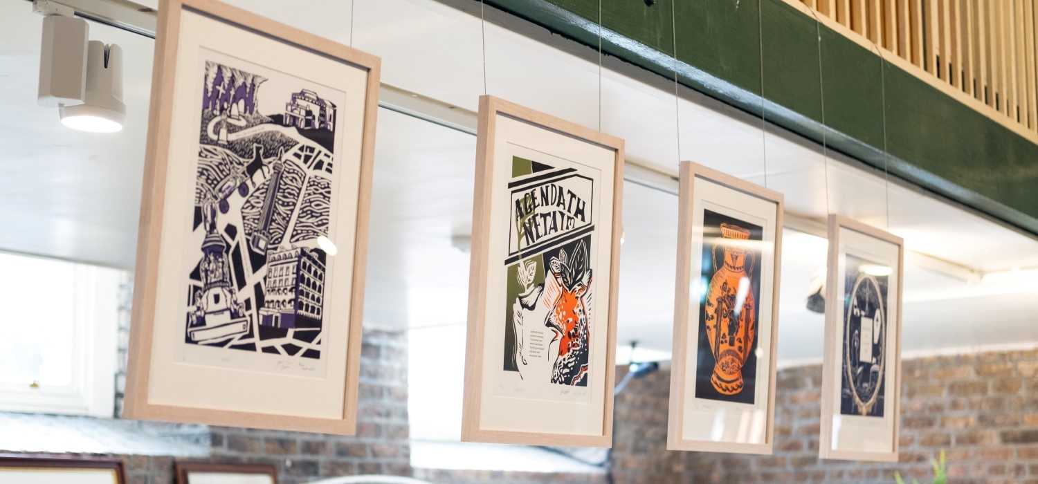 A row of framed prints depicting different episodes from James Joyce's Ulysses